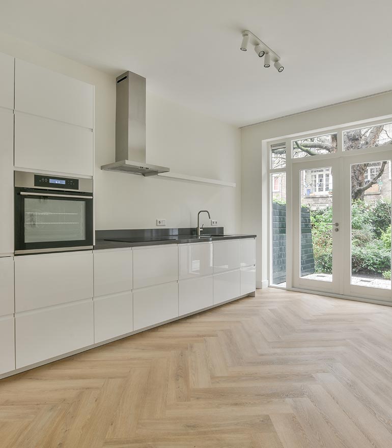 Waterproof Norman Gold Herringbone Vinyl Flooring in Kitchen