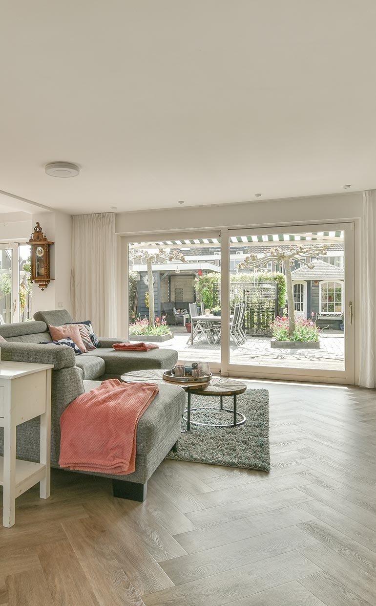 Modern Grey Herringbone LVT Flooring in Spacious Living Room