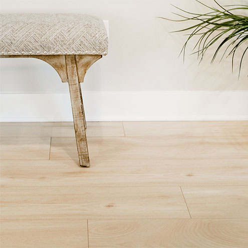 bright light SPC floor with stall on top in room